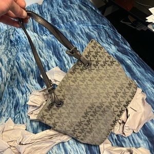 SOLD—-Michael Kors pocket book